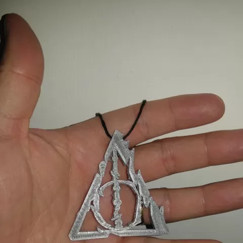 Deathly Hallows symbol from Fantastic Beast 2 poster by Enrique Esteban De Rosa Prieto