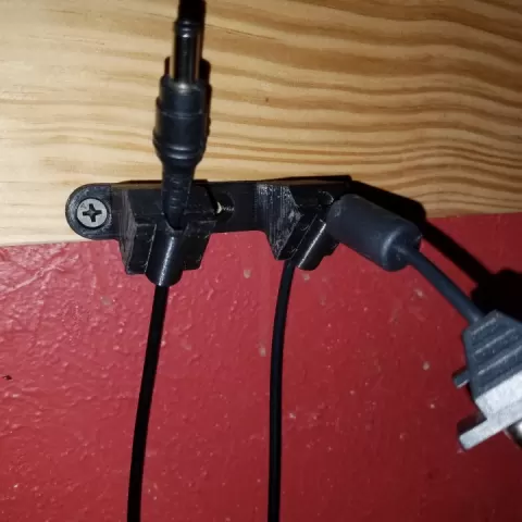 Dual Permanent Cable Wall Holder by Bob Strait