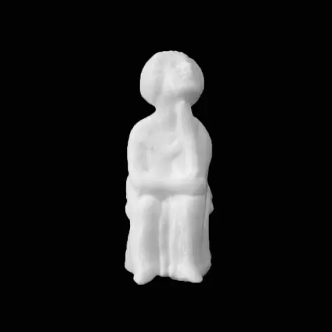 Figure of a seated old woman at The British Museum, London by Scan The World