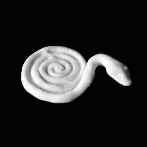 Gold weight in the form of a plain coiled snake with raised head at The British Museum, London by Scan The World