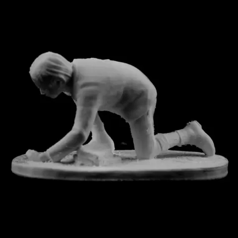 Boy playing with marbles in Valenciennes, France by Scan The World
