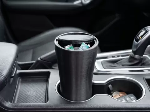 Cup holder trash bin
